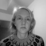 A black and white photograph of Cynthia Cruz.